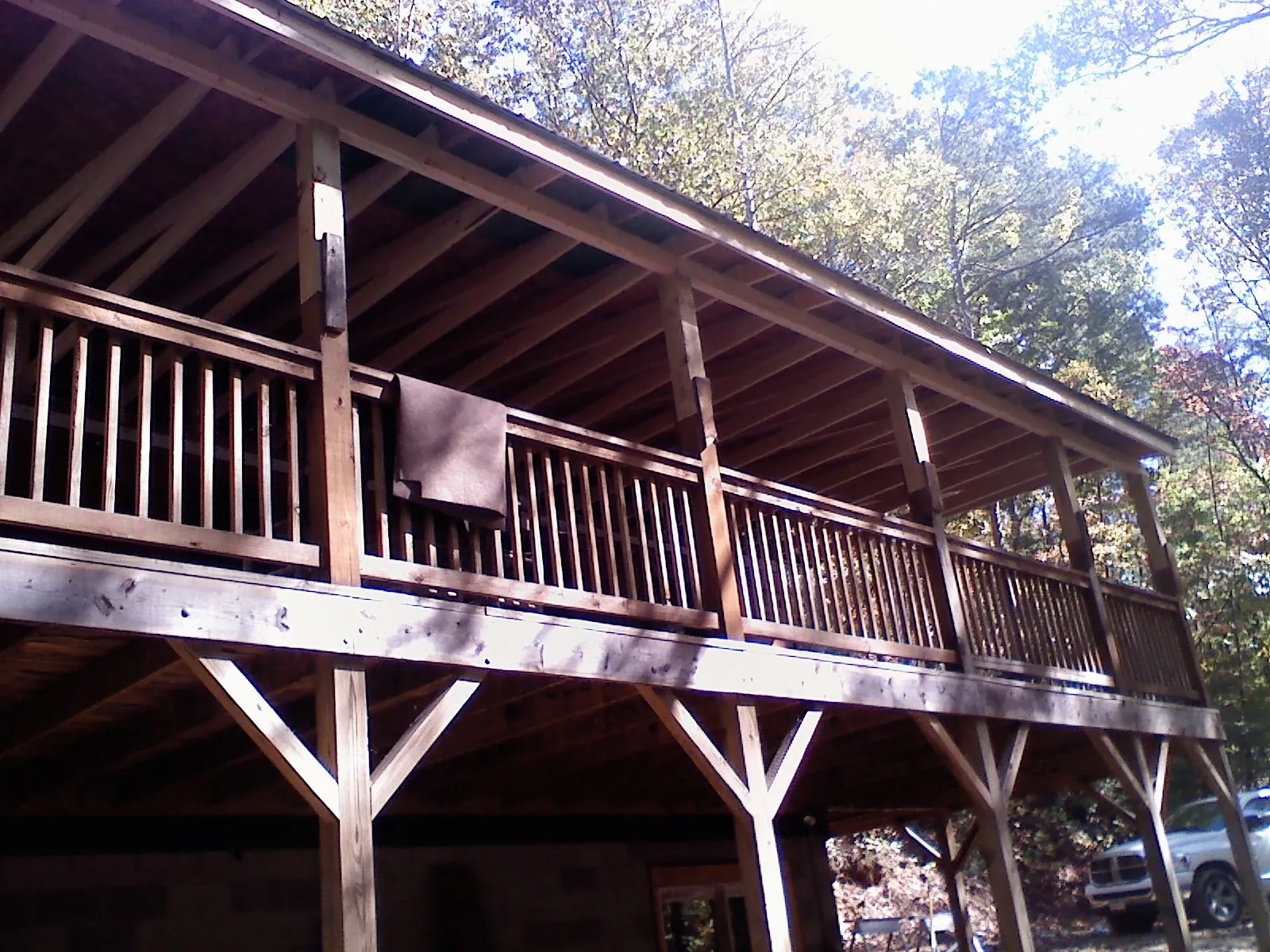 Timber framing under a new elevated porch and deck — Roof Leak Repair in Williston Park by Roofing Brothers